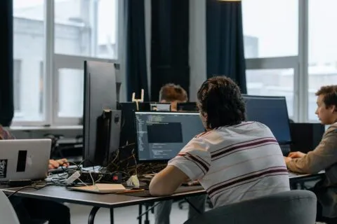 Gemini Enterprise Agent Platform — developers reviewing AI agent dashboards | Photo by cottonbro studio on Pexels