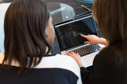 OpenAI Workspace Agents — developers reviewing AI coding workflows | Photo by Christina Morillo on Pexels
