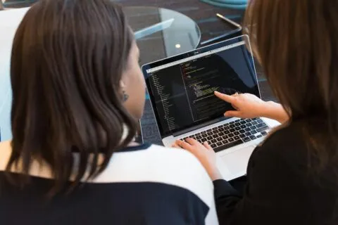 OpenAI Workspace Agents — developers reviewing AI coding workflows | Photo by Christina Morillo on Pexels