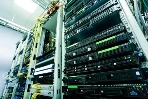 OpenAI on AWS — server racks for Bedrock AI infrastructure | Photo by Sergei Starostin on Pexels