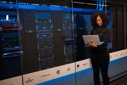 Cloudflare Dynamic Workflows tenant routing guide — engineer monitoring data servers | Photo by Christina Morillo on Pexels