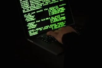 Daemon Tools backdoor checklist — cybersecurity analyst reviewing suspicious Windows activity | Photo by Sora Shimazaki on Pexels